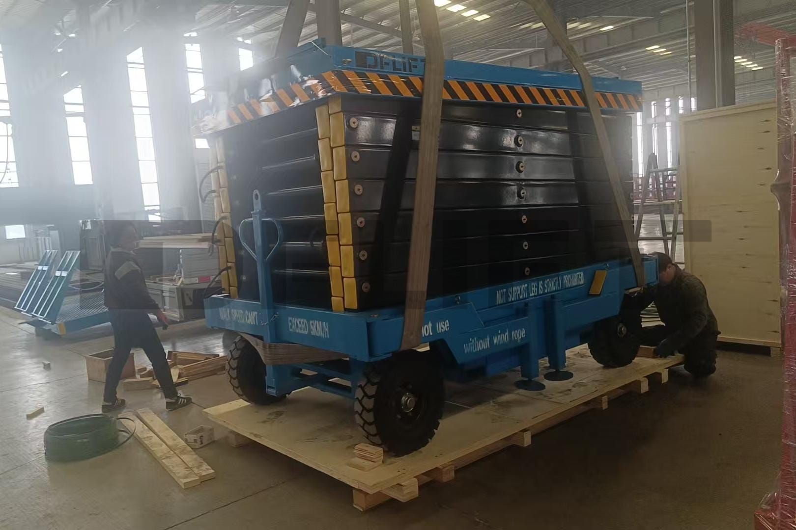 Towable Scissor Lift Being Packed